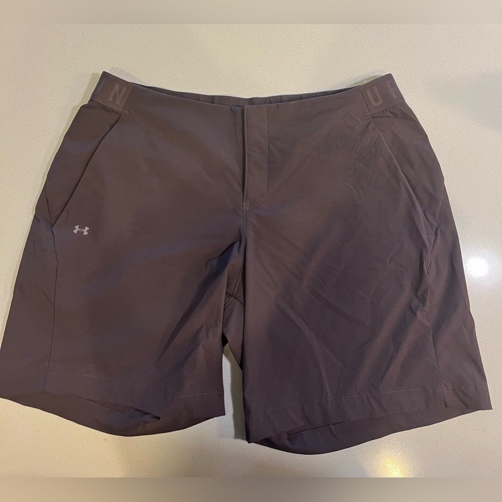 Women’s Fitted Under Armor Purple Shorts, size 10. 7” inseam. RN#96510 CA#41095